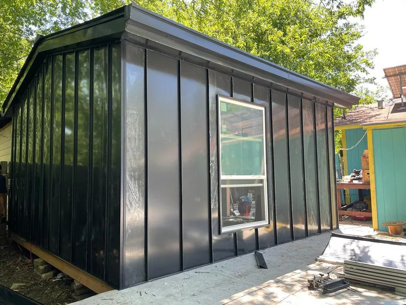 Black standing seam metal wall panels for Roof Inspection in Lakeway