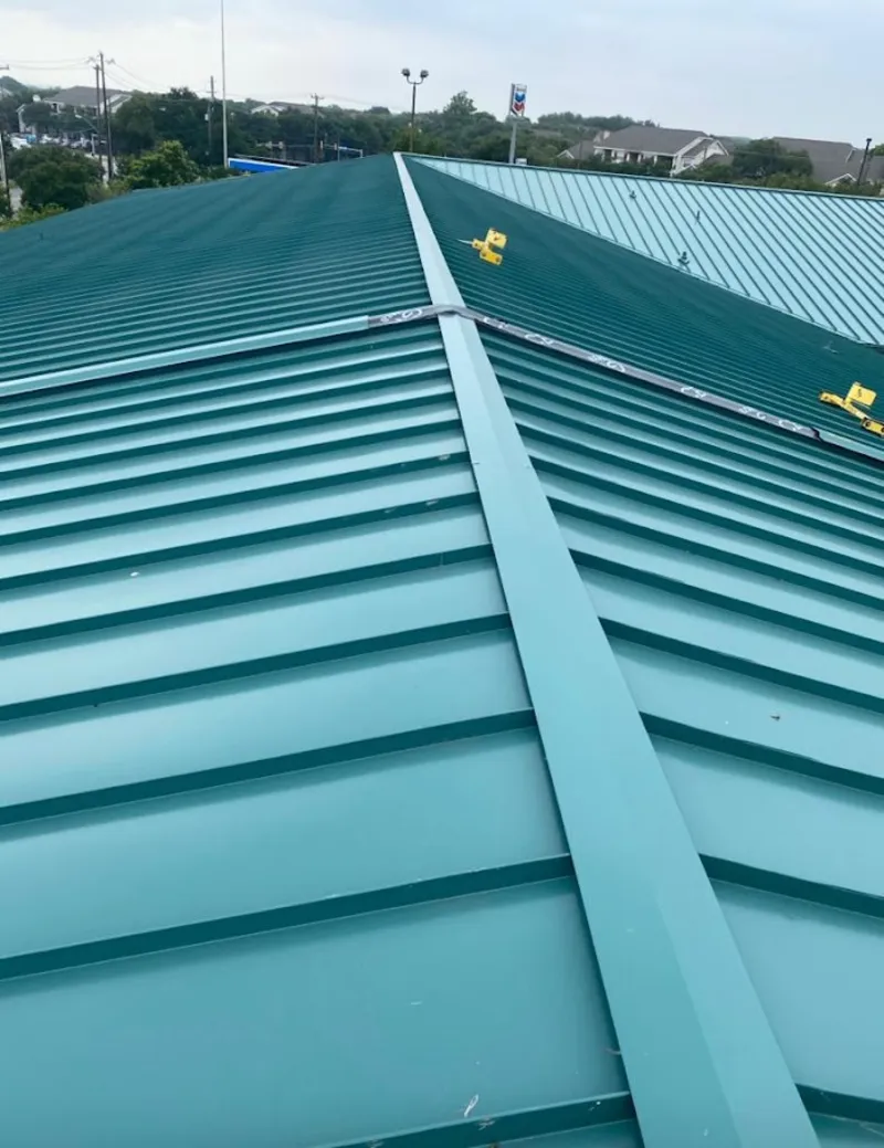 Green commercial metal roof ridge and valley for Metal Roof Repair in Lakeway